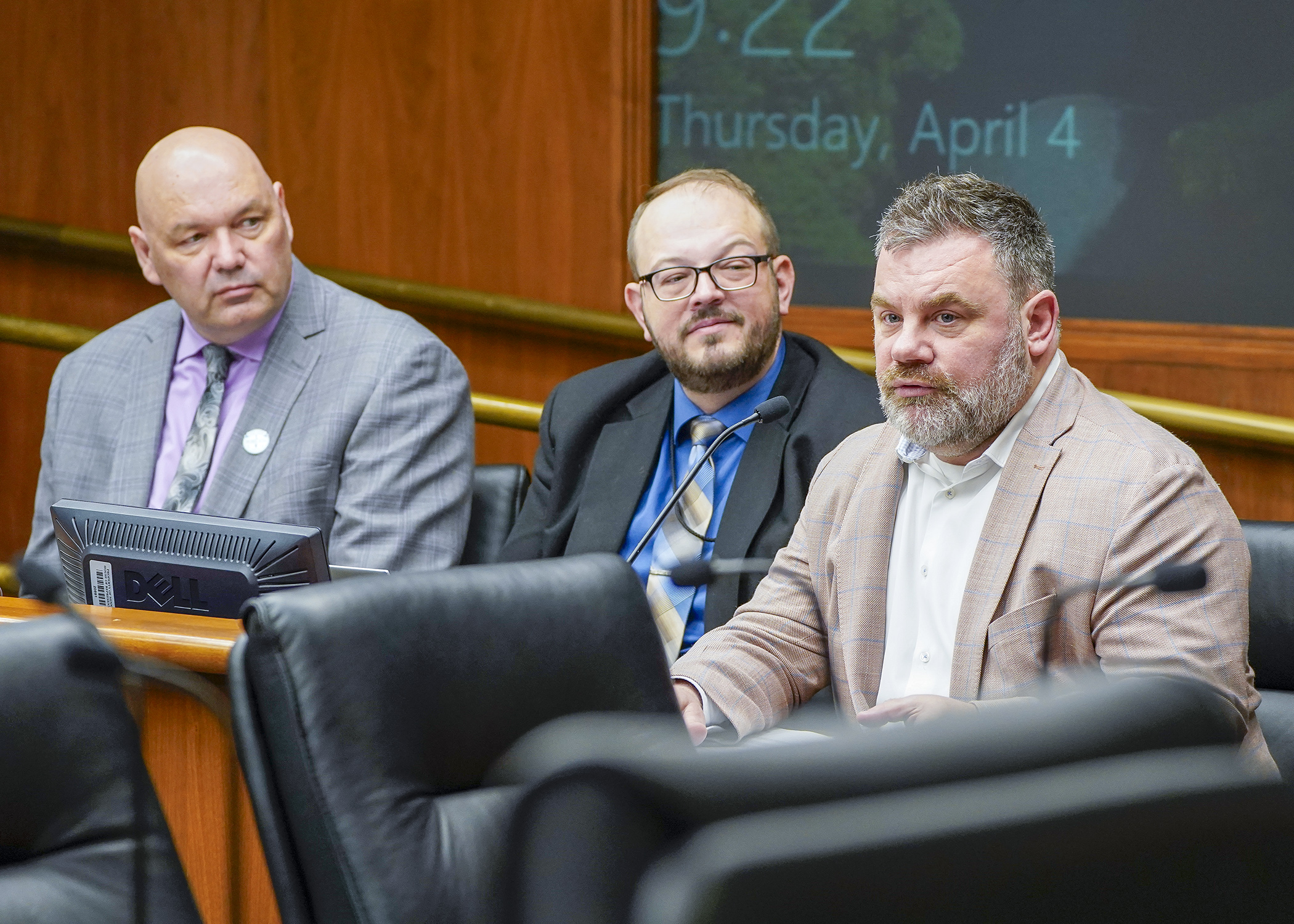 Cap O’Rourke, executive director at the Minnesota Association of Small Cities, and St. Augusta City Administrator Bill McCabe, left, testify in support of a bill that would provide small cities assistance account funding. Rep. Jeff Brand, center, is the sponsor. (Photo by Andrew VonBank)